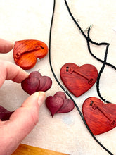Load image into Gallery viewer, Purpleheart Exotic Wood Nested Heart Necklace